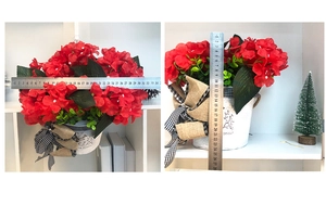 Detail showing artificial red geraniums with dimensions in white rustic floral pot