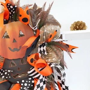 Ghirlanda di zucca di Halloween 45cm con fiocchi festivi e fogliame decorativo da porta