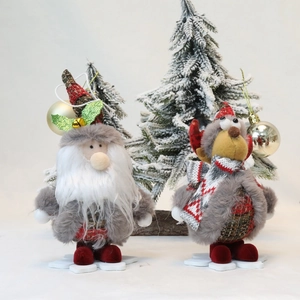 Standing Santa and Reindeer plush figurines with plaid fabric and white bases