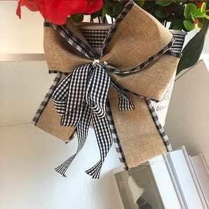 Rustic jute bow ornament with black and white plaid trim for home floral decoration
