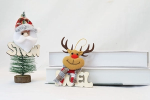 Detail of Santa and Reindeer dolls on wooden bases with SNOW and NOEL lettering
