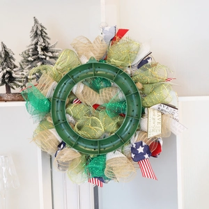Patriotic Independence Day wreath with red white blue mesh and brave pride lettering