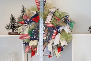 Detail of 44cm US Army themed independence day wreath with eagle crest and hero ribbons
