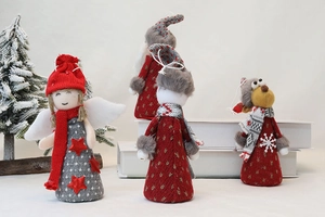 Detail of Christmas gnomes and angel dolls with knit red hats and snowflake patterns