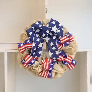 Detail of 37cm Fourth of July wreath with burlap texture and star-spangled ribbon bows