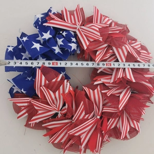 Detail showing American flag wreath diameter measurement of 29cm with a tape measure