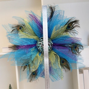 Handmade peacock feather wreath wall decor with blue glitter mesh petals, 50cm diameter