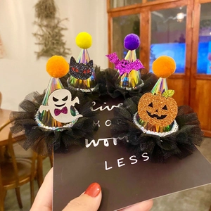 Detail view of 4 Halloween glitter hair clips with ghost, cat, bat and pumpkin designs