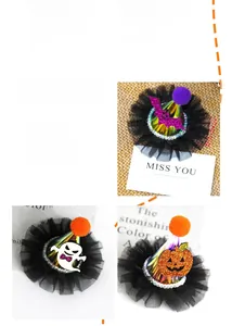 Detailed view of Halloween glowing hair clips with wizard hats, ghosts, and pumpkins