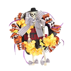 Halloween wreath featuring a skeleton in a top hat with bright yellow flowers and a Happy Halloween sign