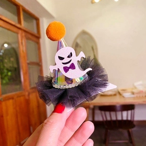 Halloween sparkly ghost hair clip with orange pompom and purple bow for kids