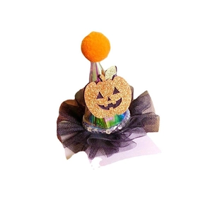 Glittering Halloween party hat hair clip with orange pompom and pumpkin face decor