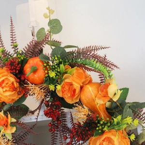 Autumn harvest pumpkin wreath with silk peonies and red berries for farmhouse door decor