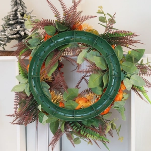 Autumn pumpkin peony floral wreath with a green plastic base for farmhouse door decoration