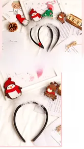 Détail de serre-tête de Noël avec plumes blanches et ornements festifs en feutrine