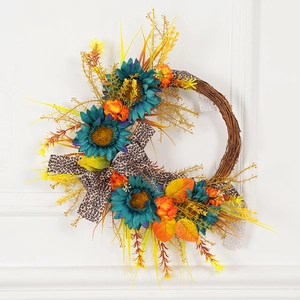 Rustic fall wreath with blue sunflowers, autumn leaves and leopard print ribbon