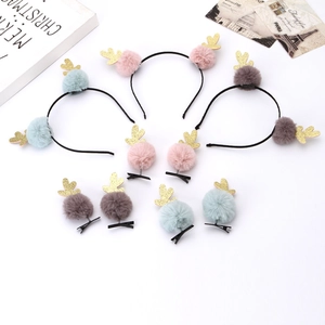 Christmas reindeer antler headbands and clips set with colorful plush balls on white background
