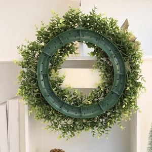 Green artificial eucalyptus wreath for wall decoration with sturdy plastic base support