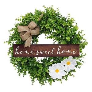 Artificial eucalyptus wreath with burlap bow and Home Sweet Home wooden sign