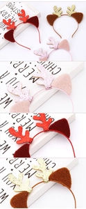 Detail view of festive sequined reindeer antlers with plush ears on headbands