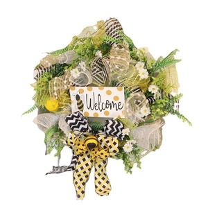 Handcrafted bumblebee welcome wreath with faux leaves and festive yellow ribbons