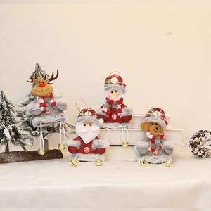 Set of four plush Christmas ornaments including Santa and Reindeer with bells