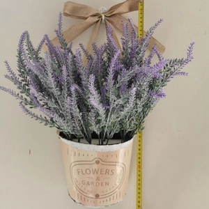 Hanging artificial lavender basket with rustic bow and measuring tape for scale