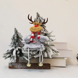 Christmas reindeer plush toy with red scarf, knitted sweater and jingling metal bells