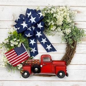 Independence Day 45cm patriotic grapevine wreath with red truck and US flag on white wood