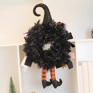 Ghirlanda di Halloween con cappello di paillettes e gambe da strega per decorazioni