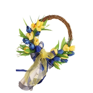 Handmade Ukraine tulip wreath with blue and yellow flowers on a natural vine base