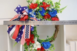 Patriotic wreath diameter measurement showing about 45cm size with ruler on white shelf
