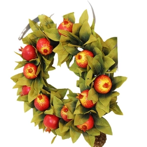 Artificial pomegranate wreath with green leaves and pine cone for autumn home wall decor