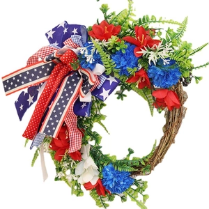 Patriotic Independence Day grapevine wreath with red white blue flowers and festive bow
