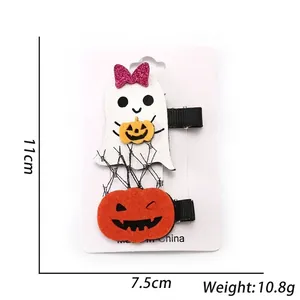 Halloween ghost and pumpkin hair clip set on a white card display for festive party dressing