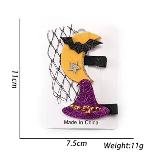 Halloween hair clips set with moon bat and purple witch hat on display card