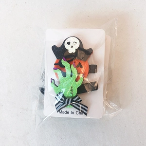 Halloween hair clips set with skull, pumpkin and monster hand on display card