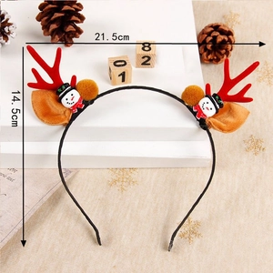 Festive Christmas antler headband with 3D snowman and red velvet horns for holiday decor