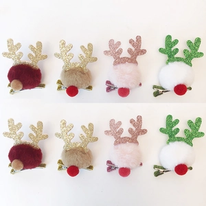 8-piece Christmas hair clip set with reindeer antlers and fluffy pompoms for festive styling