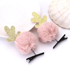 Fermagli per capelli in pelliccia rosa con corna di renna glitterate dorate natalizie