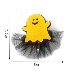 Ghost themed Halloween hair clip with yellow felt and black star patterned tulle skirt