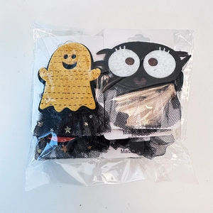 8-piece Halloween tulle hair clips set featuring felt ghosts and black bat creatures