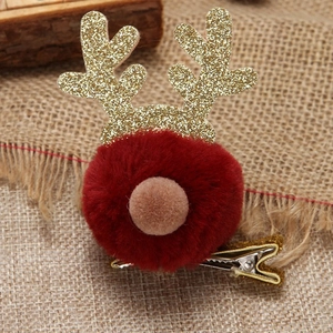 8-piece Christmas reindeer hair clips with gold antlers and soft red plush pom-poms