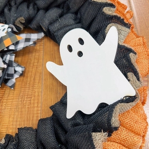 Halloween wreath with orange and black burlap, white ghost charm and pumpkin ribbons