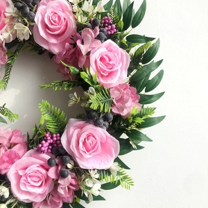 Artificial 45cm floral wreath with pink roses, purple berries and green leaves