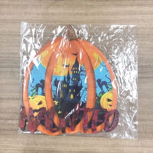 Halloween pumpkin wooden hanging sign with Haunted text and jute rope decoration