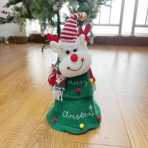 Detail of a reindeer Christmas tree plush doll with Merry Christmas embroidery and red scarf