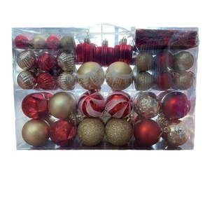 87pcs red and gold Christmas ornament set with diverse finishes in a clear storage box
