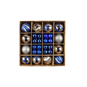 Detailed top view of 16 blue and gold Christmas ball ornaments in a square grid gift box