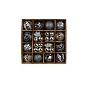 Detail of 16 piece Christmas ball set with matte, glitter and glossy finishes in a box